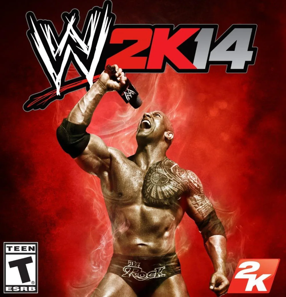 A muscular man with tattoos on his chest and arms, wearing black wrestling trunks with "The Rock" written on them, is holding a microphone in his right hand. The background is red with smoke effects, and there's a large "WWE 2K14" logo above him. The bottom left corner has an ESRB rating of "TEEN," and the bottom right corner features the "2K" logo.